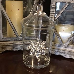 Heavy glass apothecary or candy jar with crystal snowflake